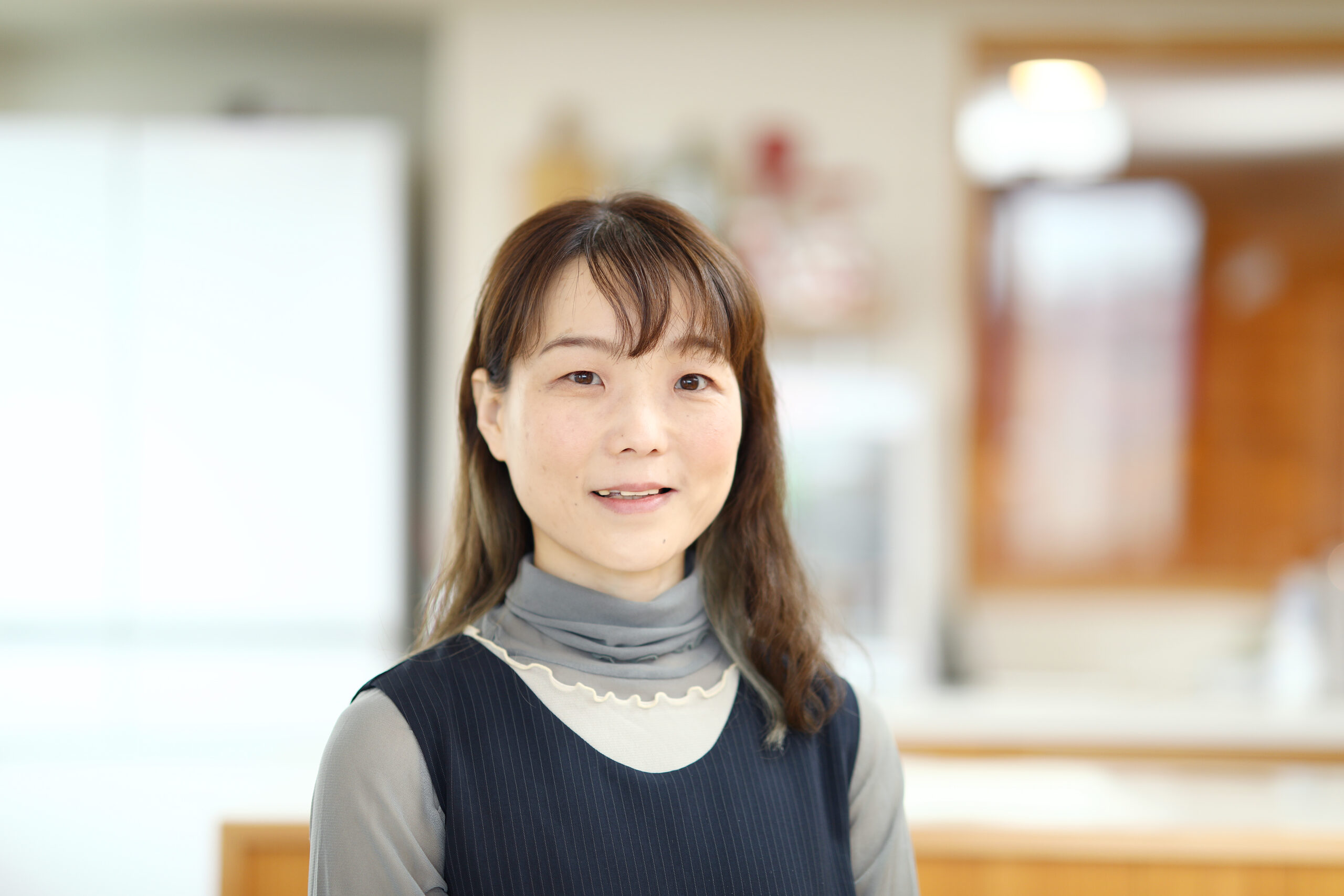 崔美禮 スタッフ写真